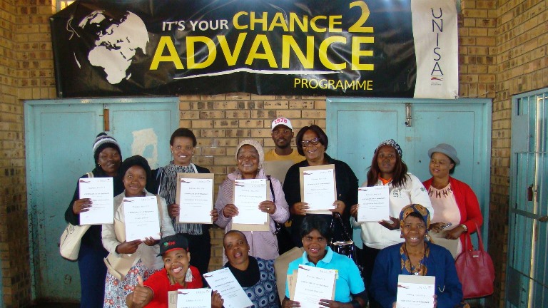 Community participants showcasing their certificates of attendance